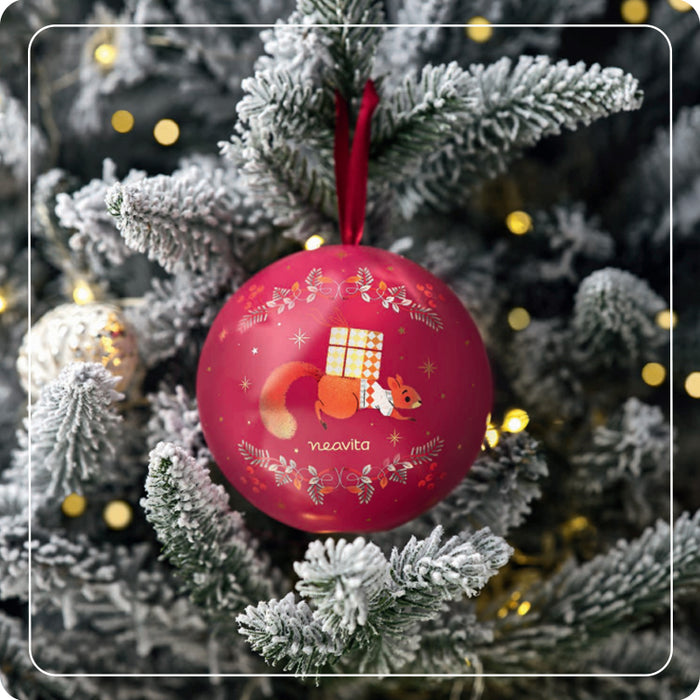 Red Christmas ball with 'Christmas Tea'